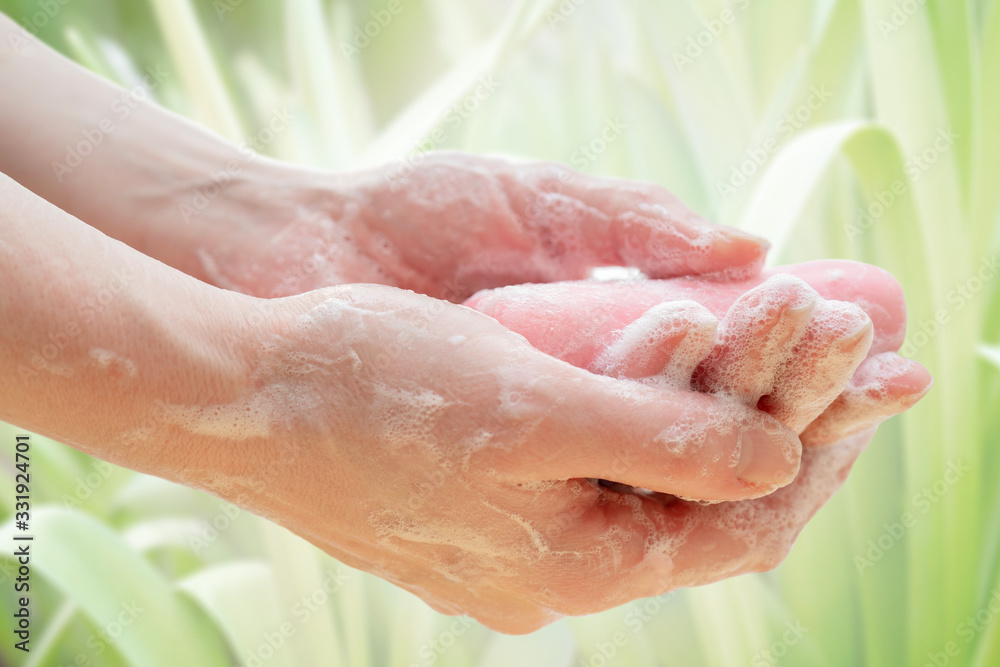 Antibacterial soap in the hands. Hand disinfection with soap. Cleanliness and hygiene in everyday life. Hand hygiene Antibacterial soap in the hands. Hand disinfection with soap. Cleanliness and hygiene in everyday life. Hand hygiene