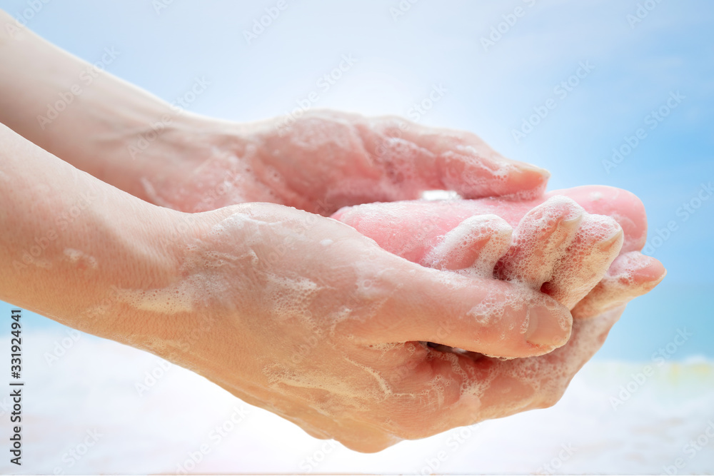 Antibacterial soap in hands. Hand disinfection with soap. Cleanliness and hygiene in everyday life. Hand hygiene
