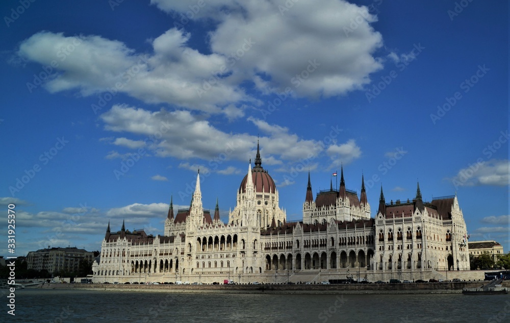 parliament of budapest on the danube blue sky