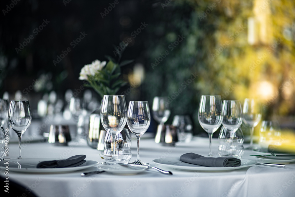 Fototapeta premium Beautiful table set for an event party or wedding reception . restaurant interior