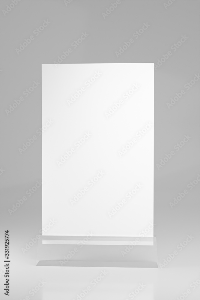 3d render Menu frame standing on plastic table isolated on wooden table white background with clipping path. space for text marketing promotion Bar restaurant ,Stand for booklet white sheets of paper. 3d render Menu frame standing on plastic table isolated on wooden table white background with clipping path. space for text marketing promotion Bar restaurant ,Stand for booklet white sheets of paper.