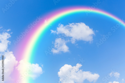 Blue sky and clouds with rainbows background