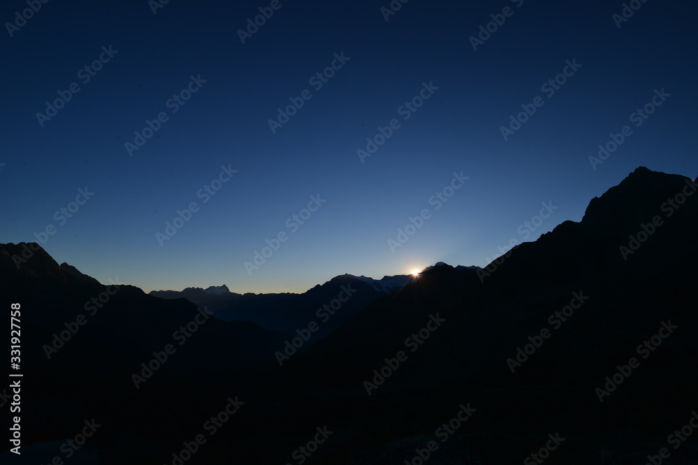 Mountain silhouette in the morning in Switzerland Mountain silhouette in the morning in Switzerland