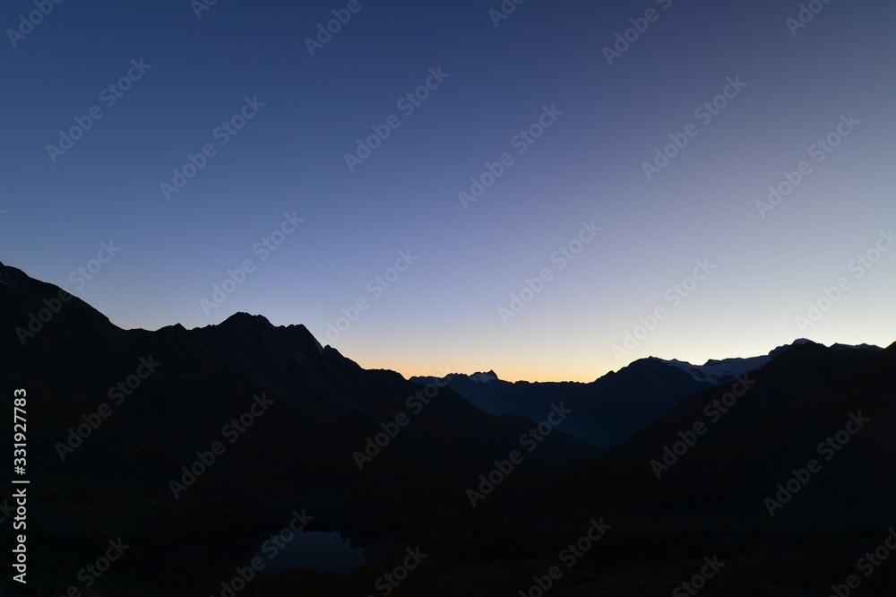 Mountain silhouette in the morning in Switzerland Mountain silhouette in the morning in Switzerland