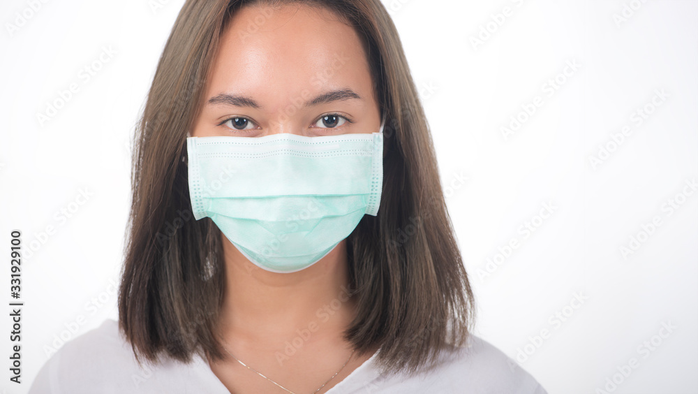 COVID-19 Pandemic Coronavirus Woman wearing face mask protective for spreading of disease virus SARS-CoV-2. Girl with surgical mask on face against Coronavirus Disease 2019. COVID-19 Pandemic Coronavirus Woman wearing face mask protective for spreading of disease virus SARS-CoV-2. Girl with surgical mask on face against Coronavirus Disease 2019.