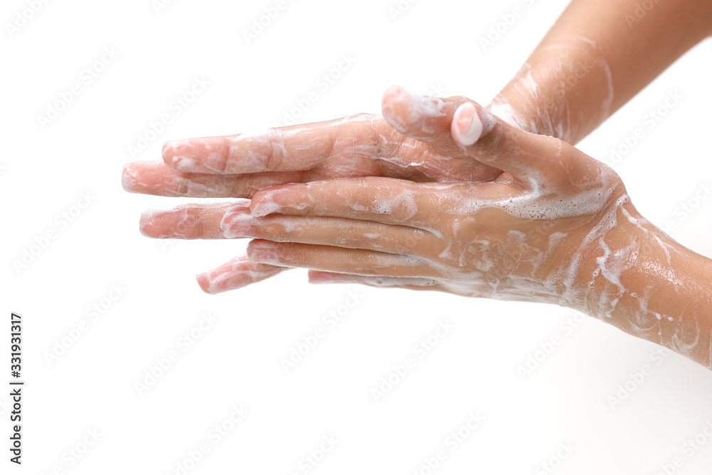 Washing hands with soap on light background. Personal hygiene concept. Washing hands with soap on light background. Personal hygiene concept.