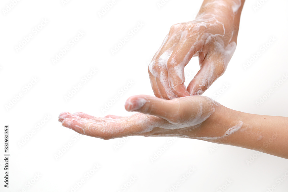 Washing hands with soap on light background. Personal hygiene concept. Washing hands with soap on light background. Personal hygiene concept.