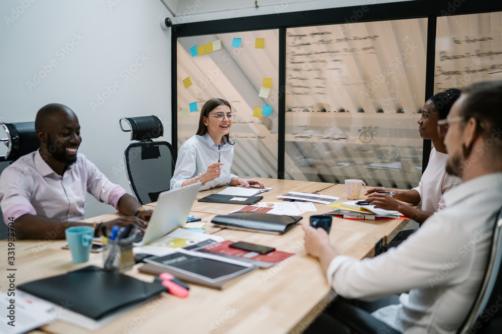 Fototapeta premium Happy office worker having fun with colleagues