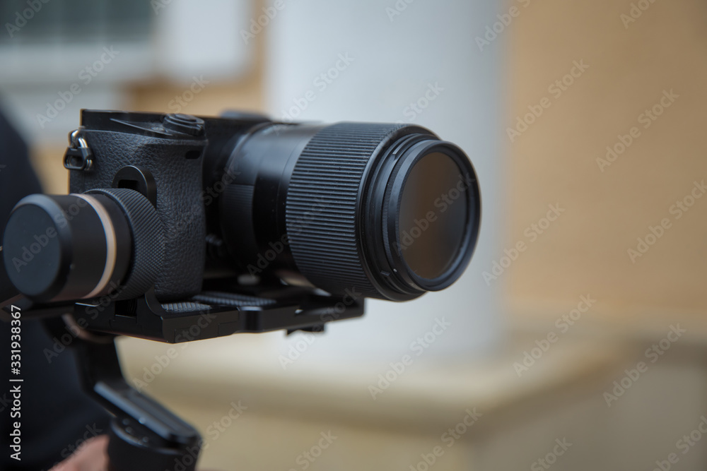Focus on tripod mounted camera screen showing . Digital equipment recording video . Close up successful man recording video, using digital . Blogger recording vlog video on camera