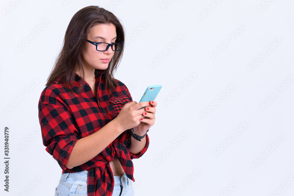 Portrait of young beautiful hipster woman using phone Portrait of young beautiful hipster woman using phone
