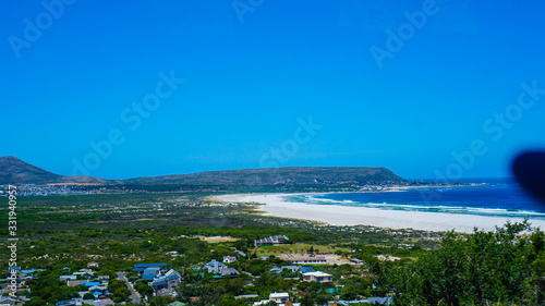 Blue ocean and white sand of South Africa beach tropical beach vacation scene