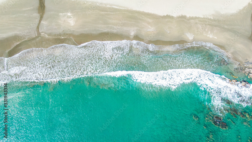 Emerald green sea and white shore.  Shoot with a drone from the sky