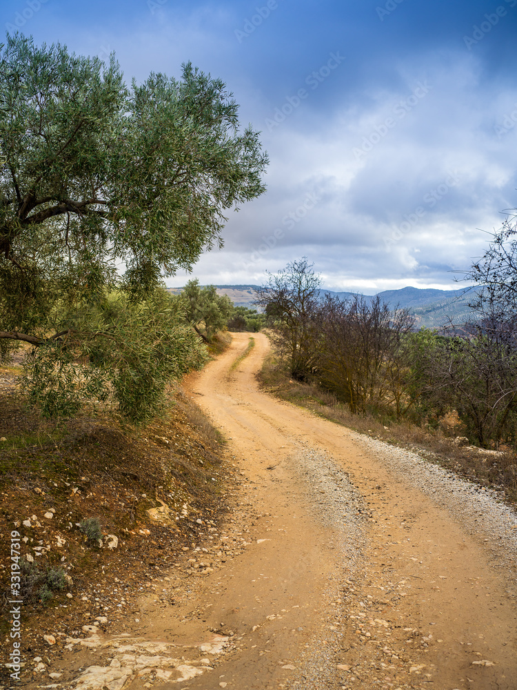 Small dirt road on the countryside on mountains