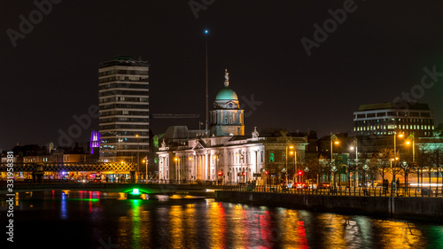 Beautiful night view scene Dublin city center old town Ireland cityscape reflection river Leahy long exposure The Custom House
