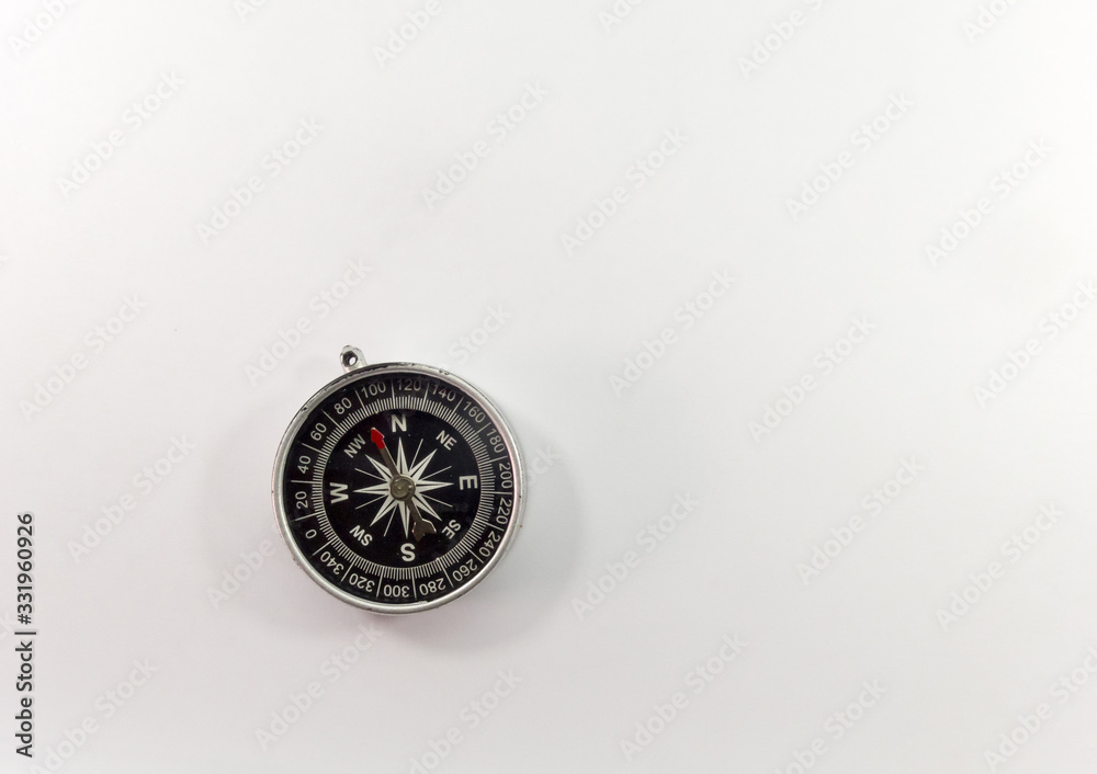 Black compass on a white background. Black compass on a white background.