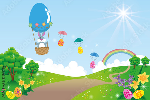 Spring landscape with easter rabbit flying on a balloon