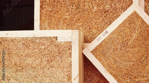 Straw panels frame construction in manufactory.