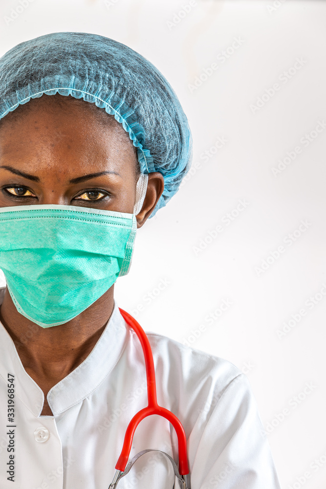 Female american african doctor, nurse woman wearing medical coat ,cap, with stethoscope and mask. Female american african doctor, nurse woman wearing medical coat ,cap, with stethoscope and mask.