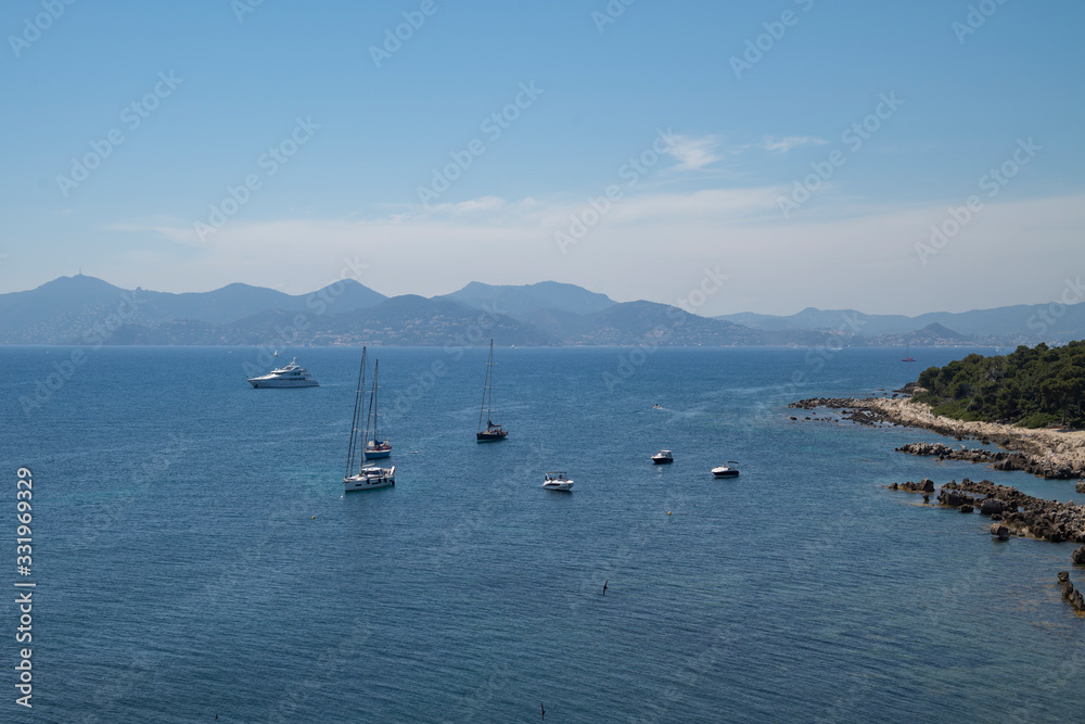 View on the sea and boats from Saint-Honorat Island fortress, Cannes, France. Lerins islands landscape. Tourism in Cannes.