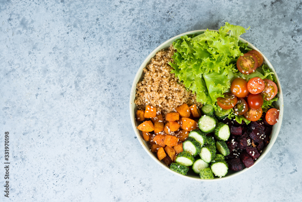 Vegan dish, quinoa salad with baked and fresh vegetables. Vegan dish, quinoa salad with baked and fresh vegetables.