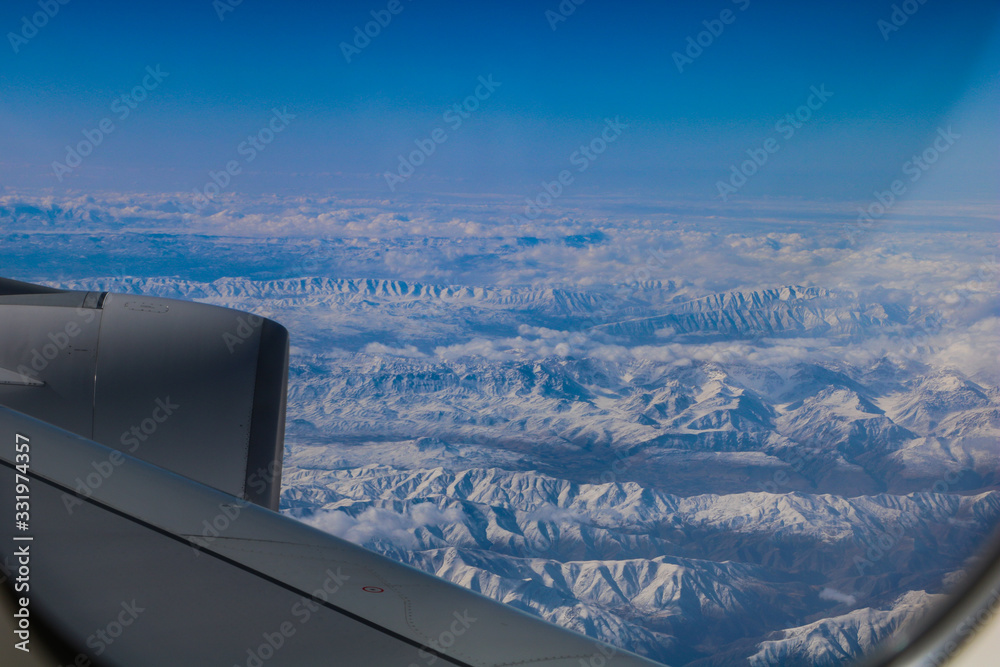 airplane flying above the clouds airplane flying above the clouds