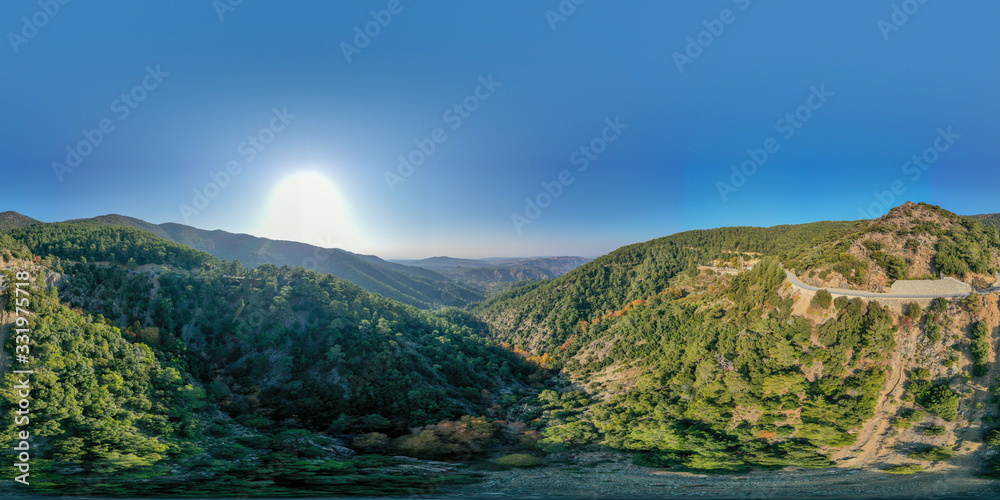 360 degree spherical panorama landscape of Cyprus mountains. Mountain road and colorful forest