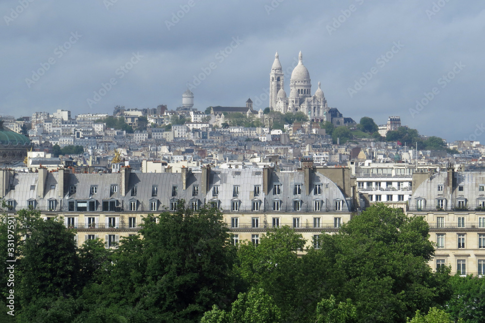 Panorama view of the famous Montmartre borough in the 18th arrondissement with the Basilica of the Sacre Coeur; France, Europe