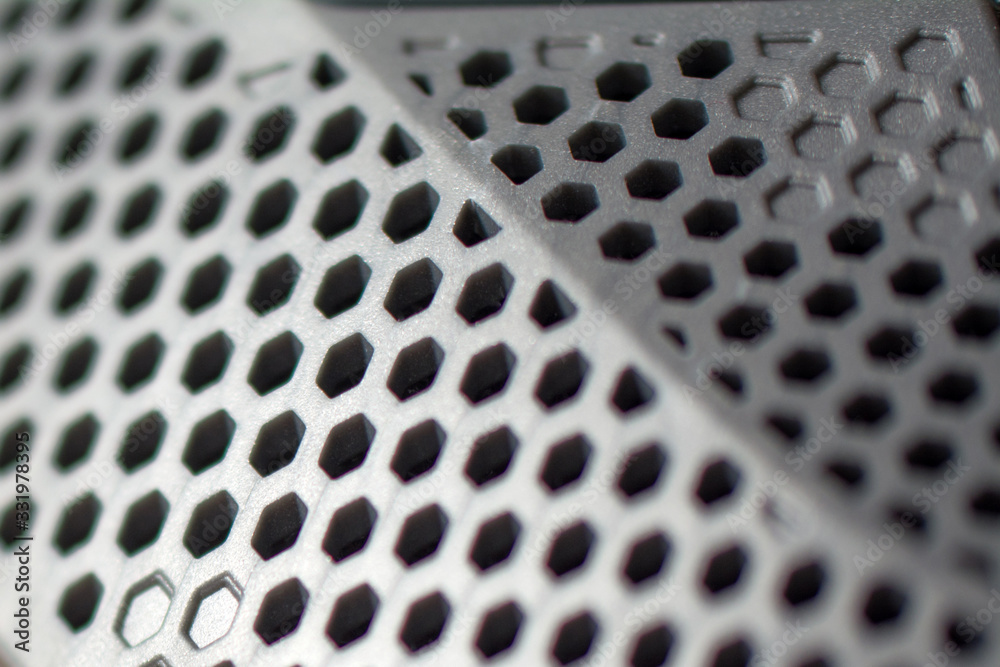 Metal perforated sheet, background with circles. Texture plastic with hole.