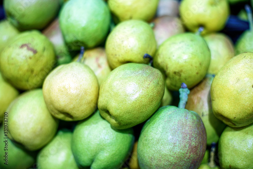 Green pears at fruits market