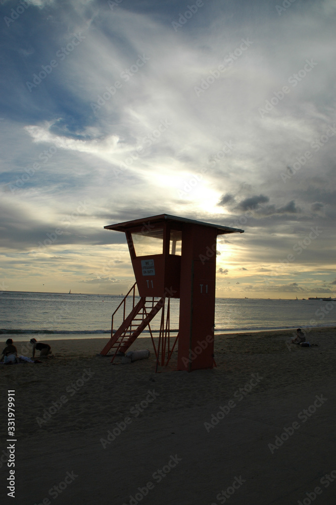 lifeguard tower in silhouette