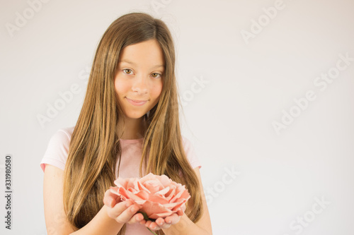 Beautiful girl with rose in her hand © Danko