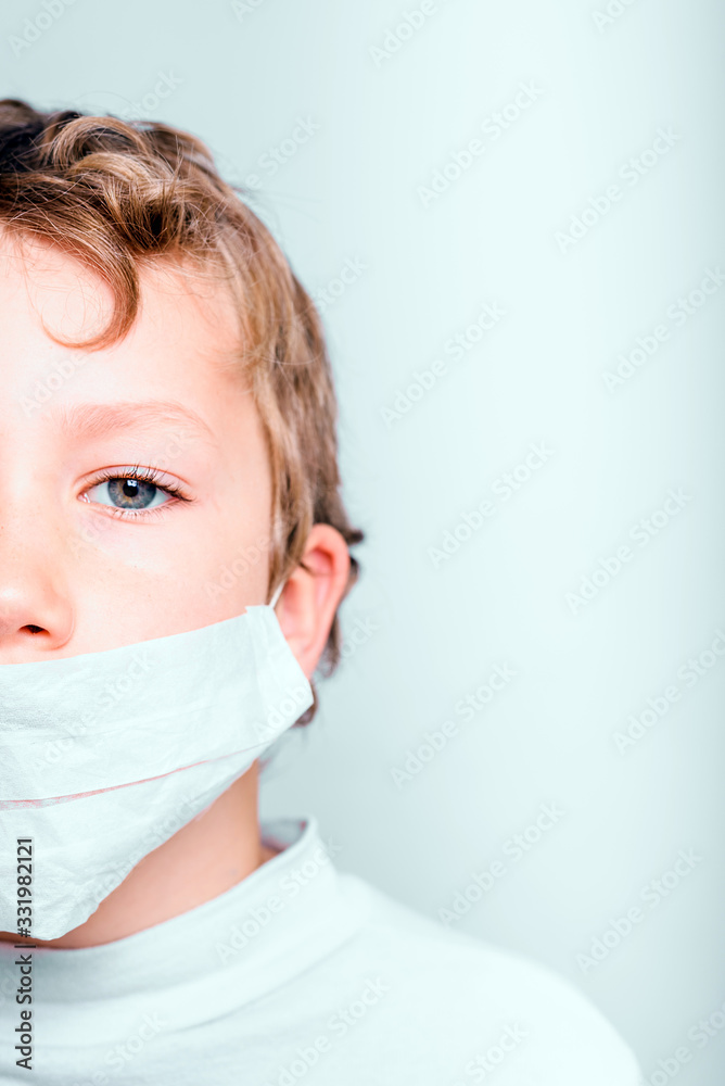 Vertical portrait of boy isolated on white background, sick man with anti-flu mask and coronavirus. Vertical portrait of boy isolated on white background, sick man with anti-flu mask and coronavirus.