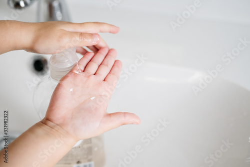 boy washing his hands after playing to fight the coronavirus. Close up of hands