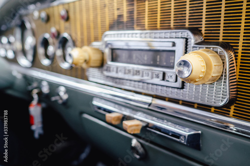 Old timer car radio dashboard close up