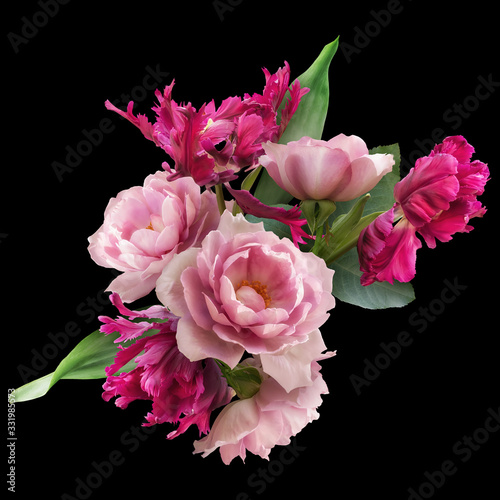 Pink roses and magenta tulips isolated on black background. Floral arrangement, bouquet of garden flowers. Can be used for invitations, greeting, wedding card.