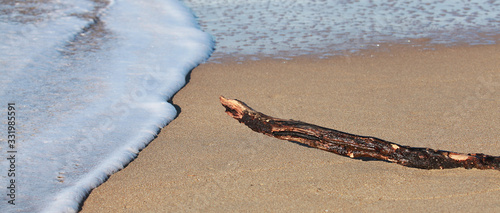 Valokuva Ecume de mer en bord de plage