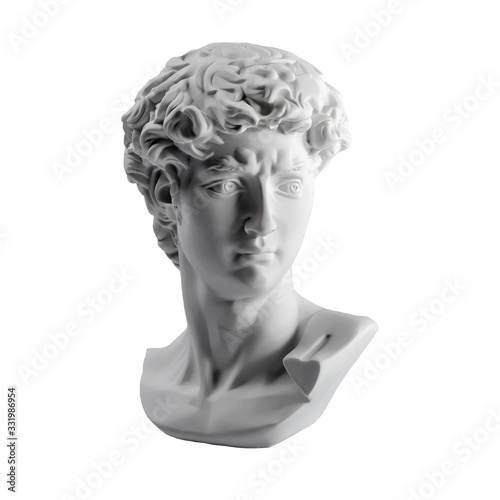 Gypsum statue of David's head. Michelangelo's David statue plaster copy isolated on white background. Ancient greek sculpture, statue of hero © Magryt