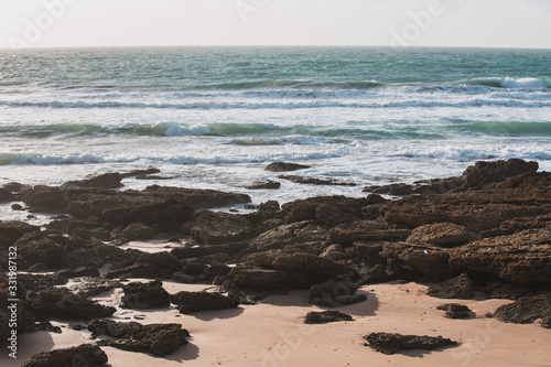 Fototapeta Naklejka Na Ścianę i Meble -  Rocks and Sands on the Seashore of El Palmar de Vejer, Cadiz, Andalusia Spain