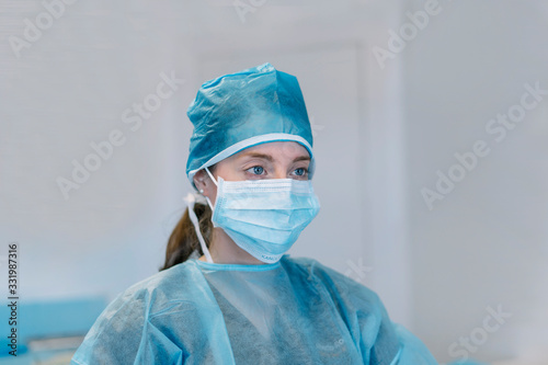 female doctor with mask protecting contagious diseases virus