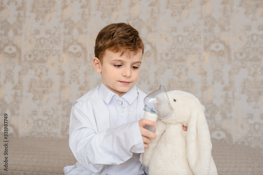 Little boy in white medical robe having fun, Little boy in white medical robe having fun,