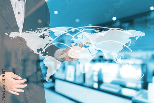 Fototapeta Naklejka Na Ścianę i Meble -  Double exposure money on network connection and city background. Elements of this images furnished by nasa