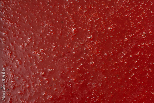 Confiture with berries. Red color. Background, texture.