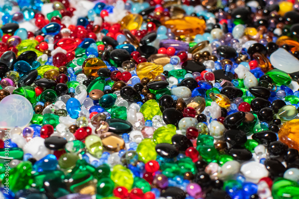 Colorful background made of different kinds of beads