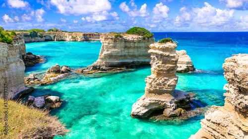 Amazing sea scenery in Puglia. "Torre di Sant Andrea" - famous rock foration near Otranto. Italy