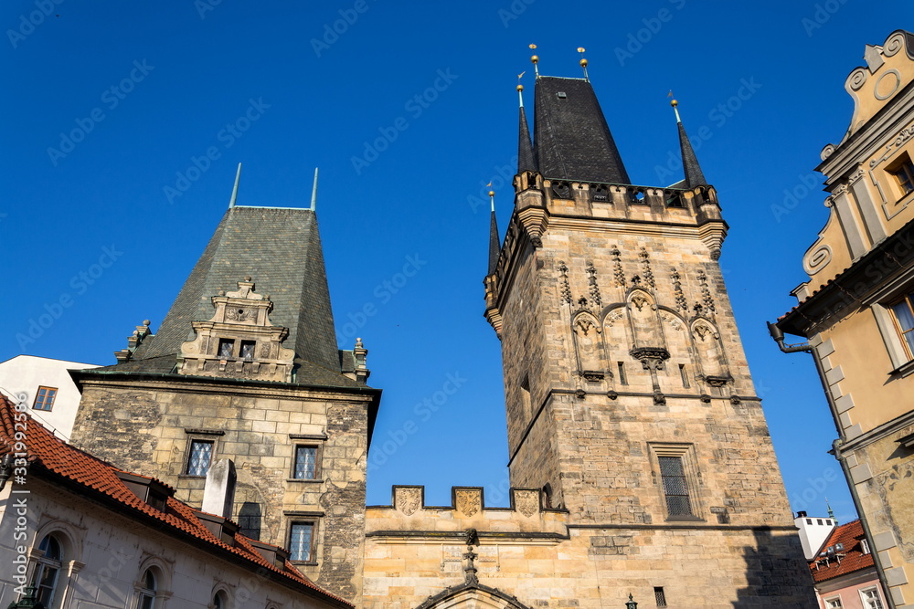 Fototapeta premium Lesser Town Bridge Tower on Charles Bridge in Prague, Czech Republic, sunny day