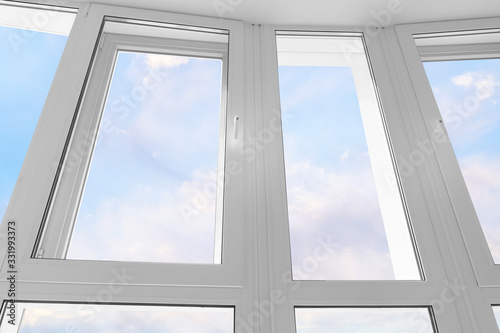 Large white plastic window against blue sky