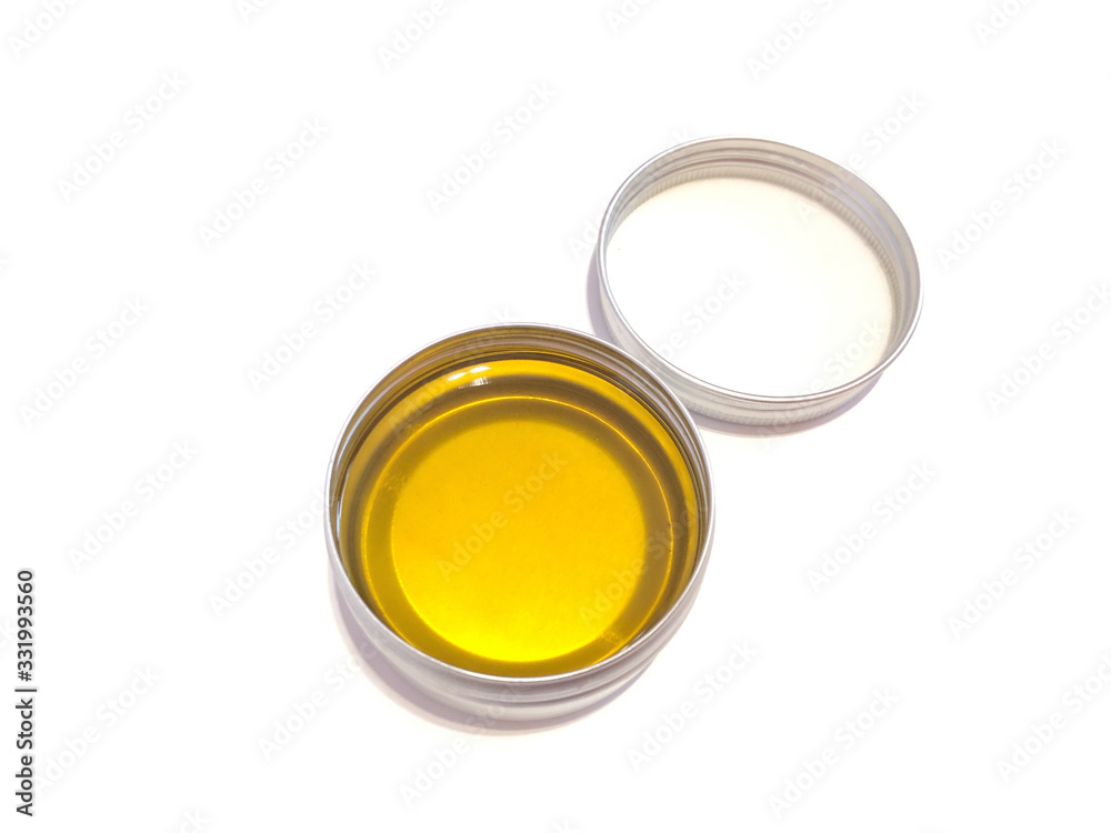 Jar with wax isolated on a white background. Body cream. Wax for hair removal. Depilation. Aromatic oil. Hygiene product. Body Oil. Hot cream. Jar with wax isolated on a white background. Body cream. Wax for hair removal. Depilation. Aromatic oil. Hygiene product. Body Oil. Hot cream.