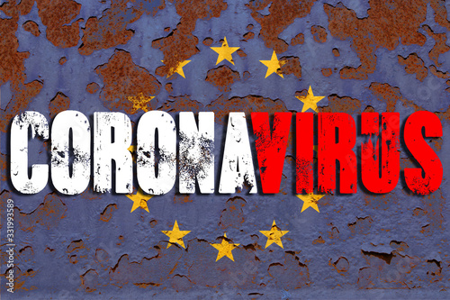 Flag of  European Union faded and rusty with a word Coronavirus