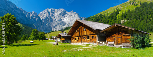 panorama landscape in bavaria with wooden old farmhouse