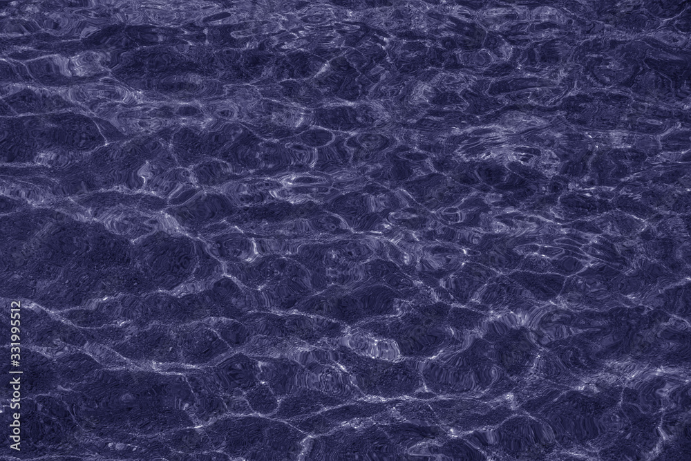 Abstract natural  dark-blue background. Texture of water. Color tinting